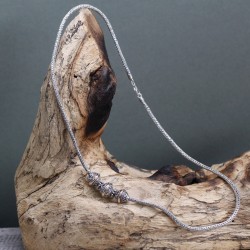 Zilveren en gouden ketting -Tri